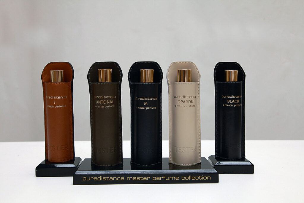 Exclusive Puredistance 100 ml Perfume flacons with a hand-made, luxurious leather holder