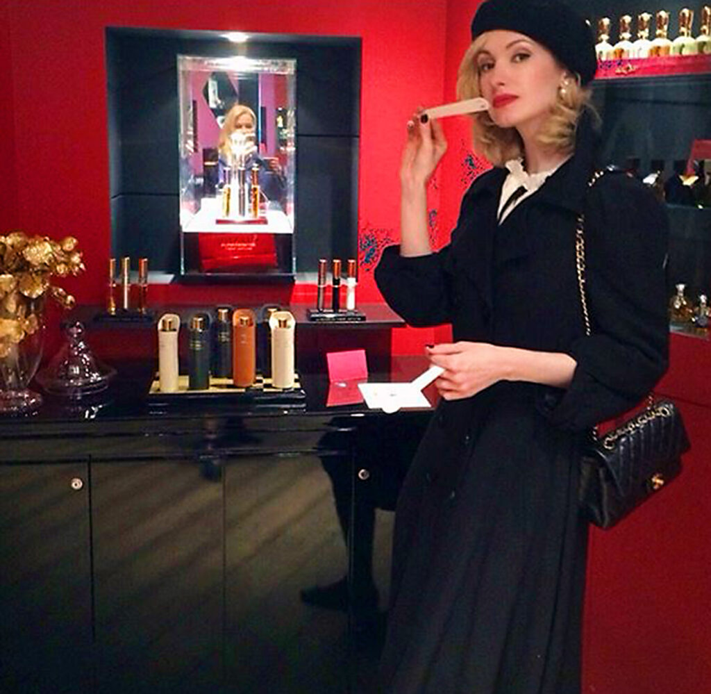 Customer trying out Puredistance Perfume in Jovoy Perfumery Paris