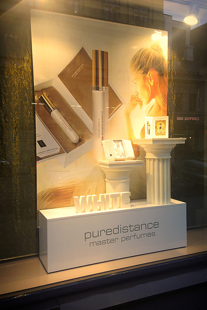 Puredistance White Perfume beautifully displayed in the window of a perfumery